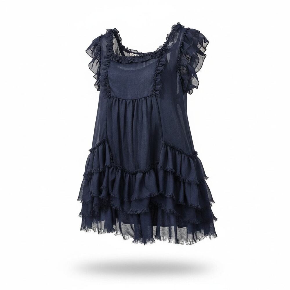 Imaginary Voyage top features a flowy, relaxed-fit design with a sheer overlay